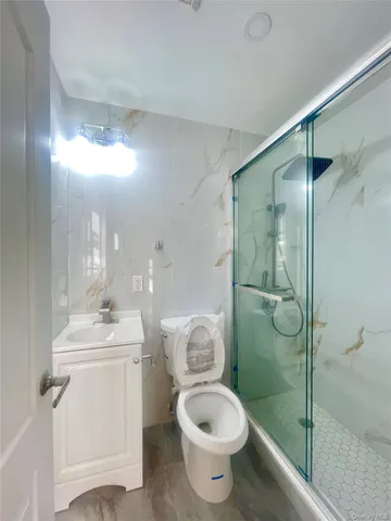 $1,099,000 | 140-14 68th Drive | Kew Gardens Hills