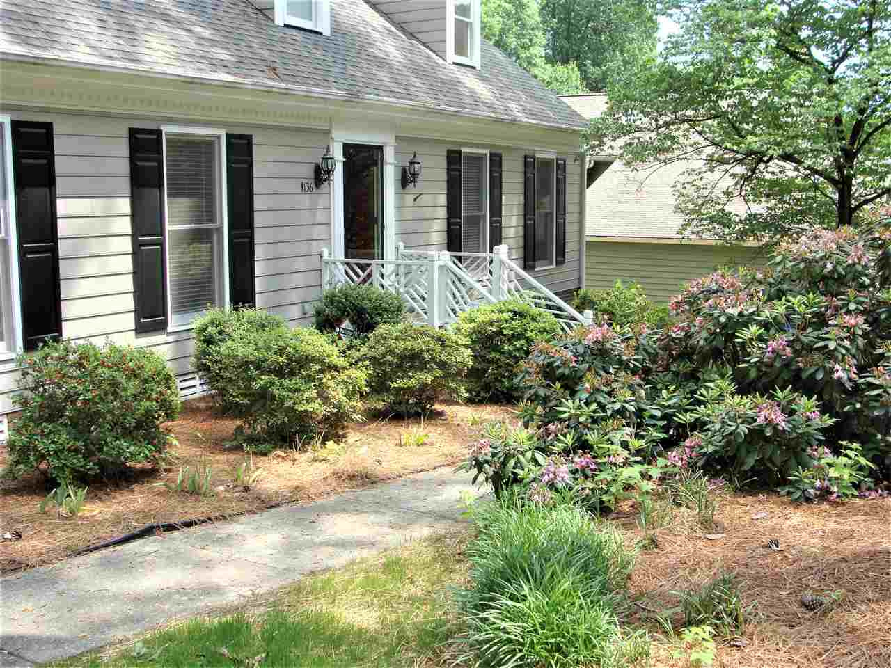 4136 Mardella Drive Raleigh, NC 27613 - Photo 25 of 30 Purple rhododendron add more color to the yard