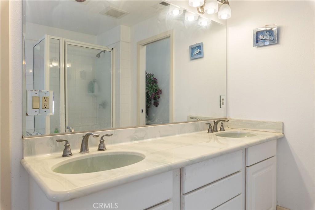 7875 Adobe Creek Road Kelseyville, CA 95451 - Photo 18 of 51 a bathroom with a sink and a mirror