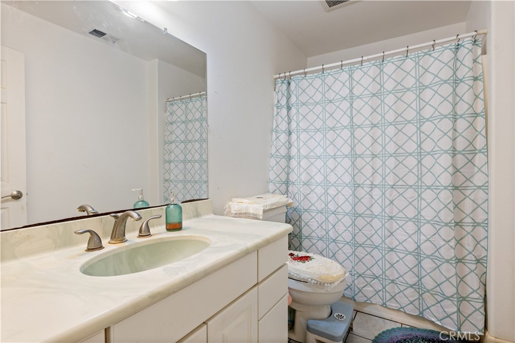 7875 Adobe Creek Road Kelseyville, CA 95451 - Photo 20 of 51 a bathroom with a sink and a toilet