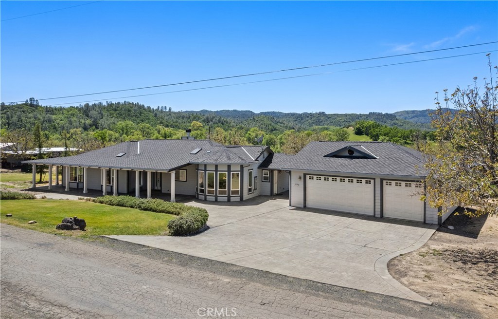7875 Adobe Creek Road Kelseyville, CA 95451 - Photo 2 of 51 front view of a house with a yard