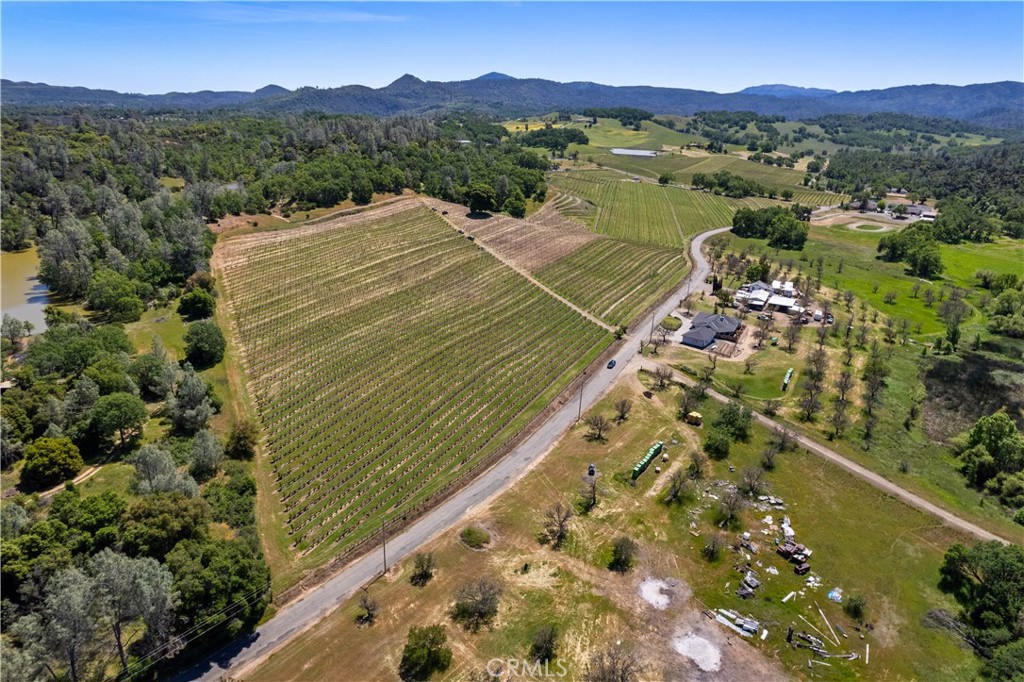 7875 Adobe Creek Road Kelseyville, CA 95451 - Photo 45 of 51 a view of a lake with a mountain