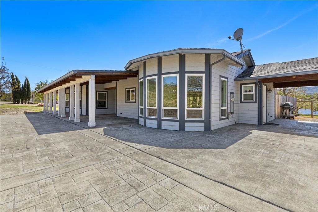 7875 Adobe Creek Road Kelseyville, CA 95451 - Photo 5 of 51 a view of a house with a porch