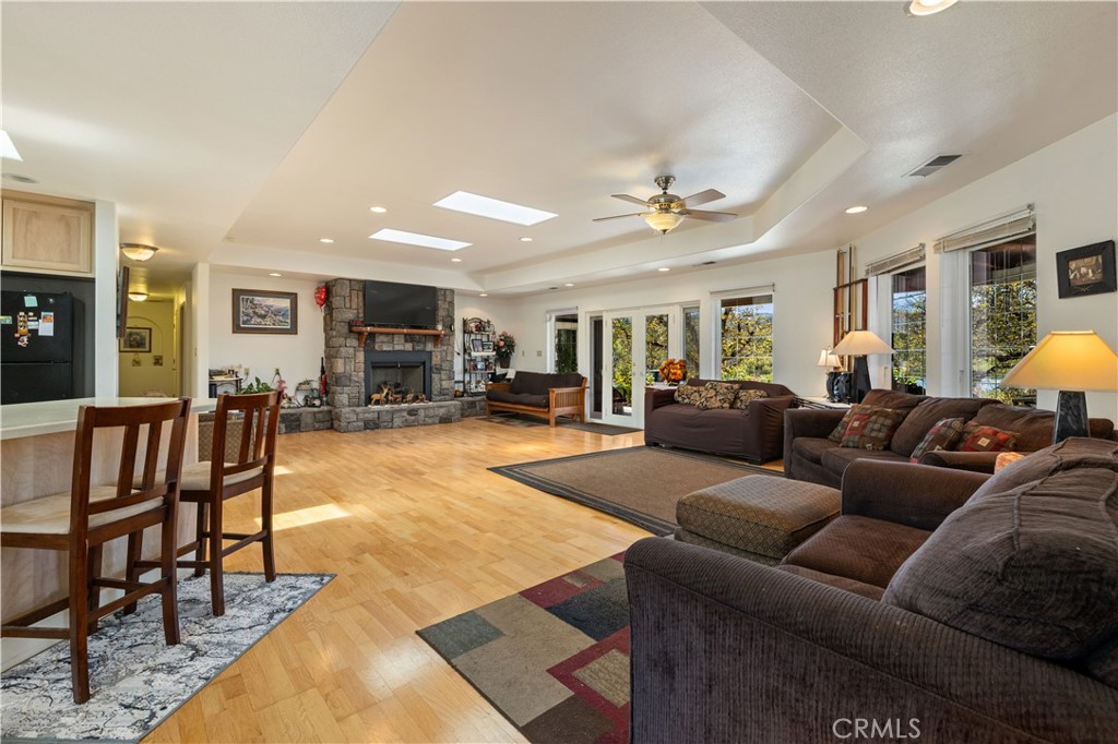 7875 Adobe Creek Road Kelseyville, CA 95451 - Photo 10 of 51 a living room with furniture a view of bedroom and a window