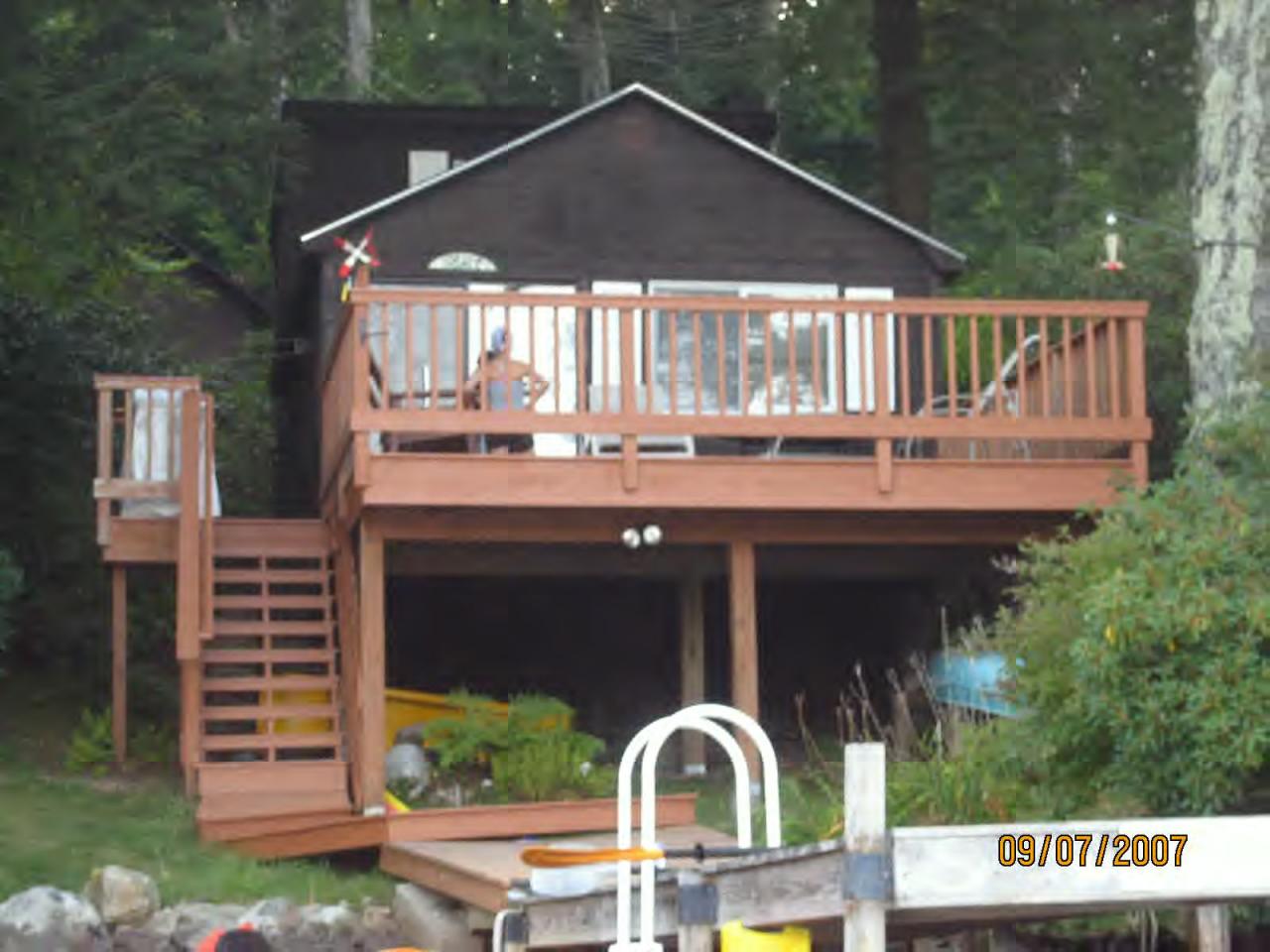 289 Old Pond Road Becket, MA 01223 - Photo 3 of 6 a front view of a house with garden
