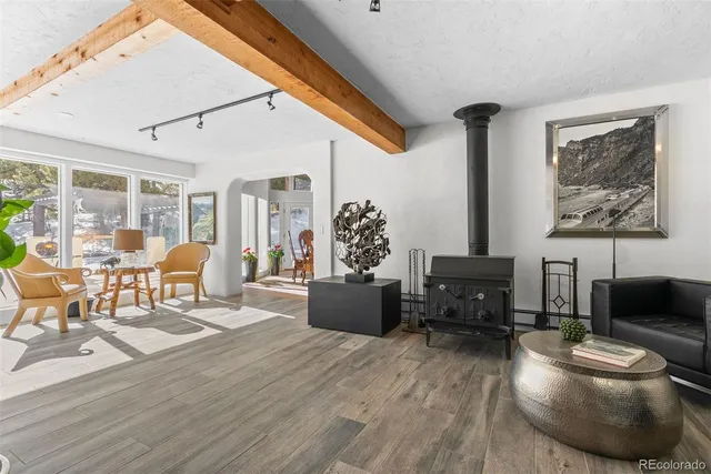 a spacious bedroom with a bed and a window