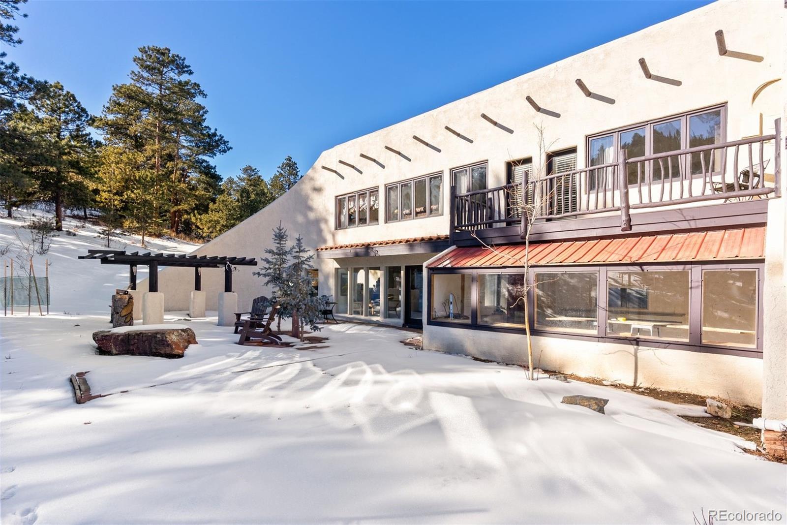 Hotel Way Evergreen, CO 80439 - Photo 47 of 50 a view of a building with sitting area