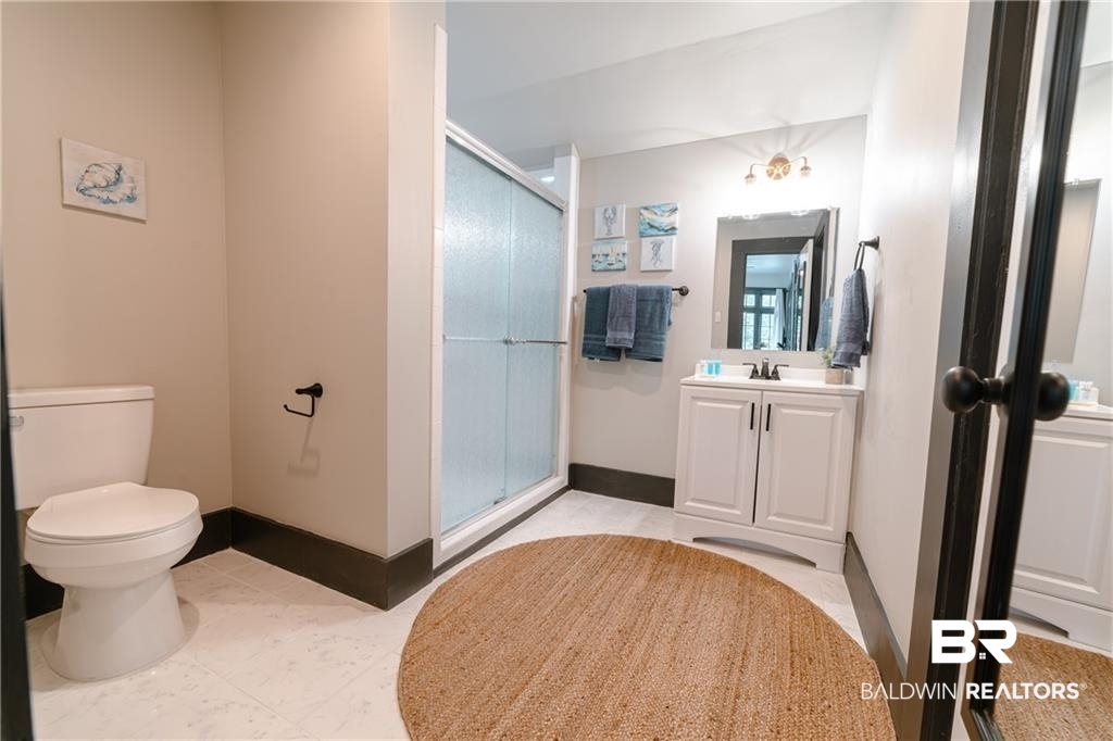 207 Michigan Avenue Mobile, AL 36604 - Photo 22 of 31 Full bathroom with vanity and a stall shower