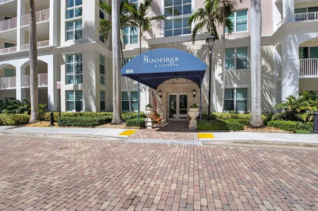 a view of a building with a swimming pool