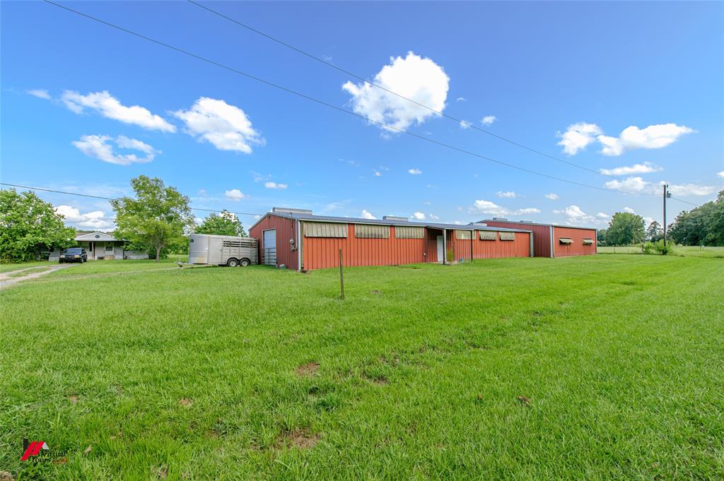 891 Pilgrim Rest Road Doyline, LA 71023 - Photo 4 of 37 314 feet of road frontage looking toward the barn and doublewide.