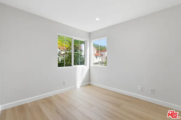 a bathroom with a sink toilet and vanity