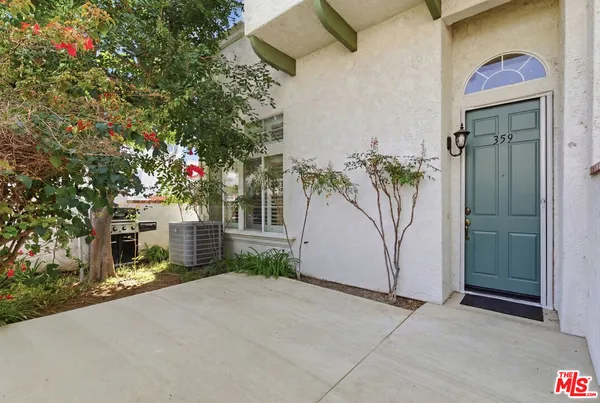a house with trees in front of it