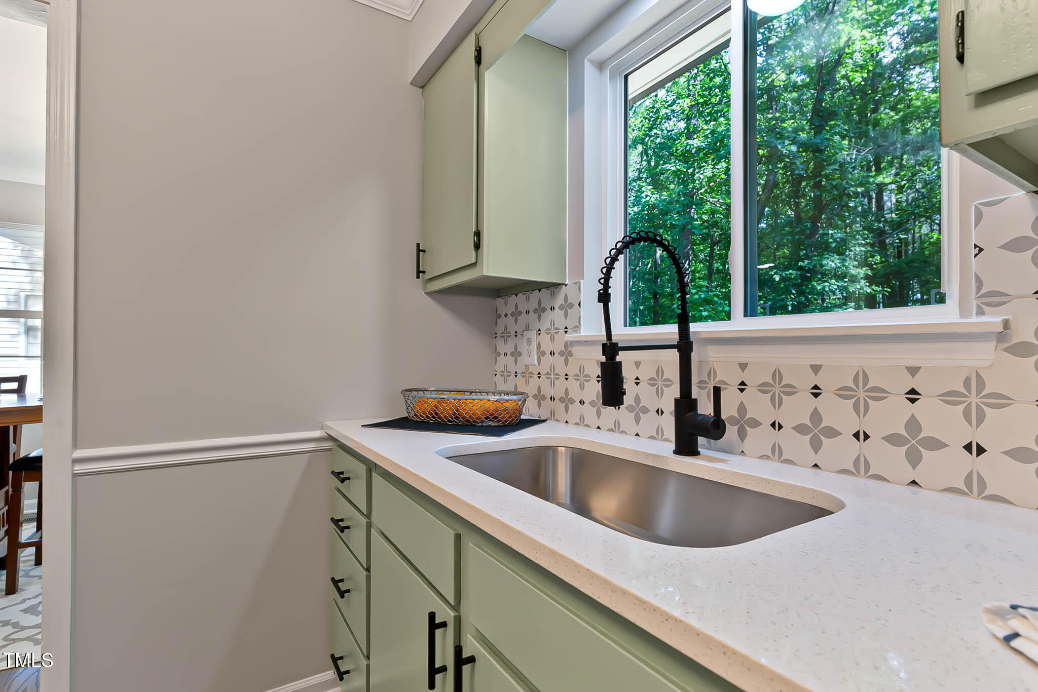 2704 Ross Road Durham, NC 27703 - Photo 12 of 28 a kitchen with a sink and a window