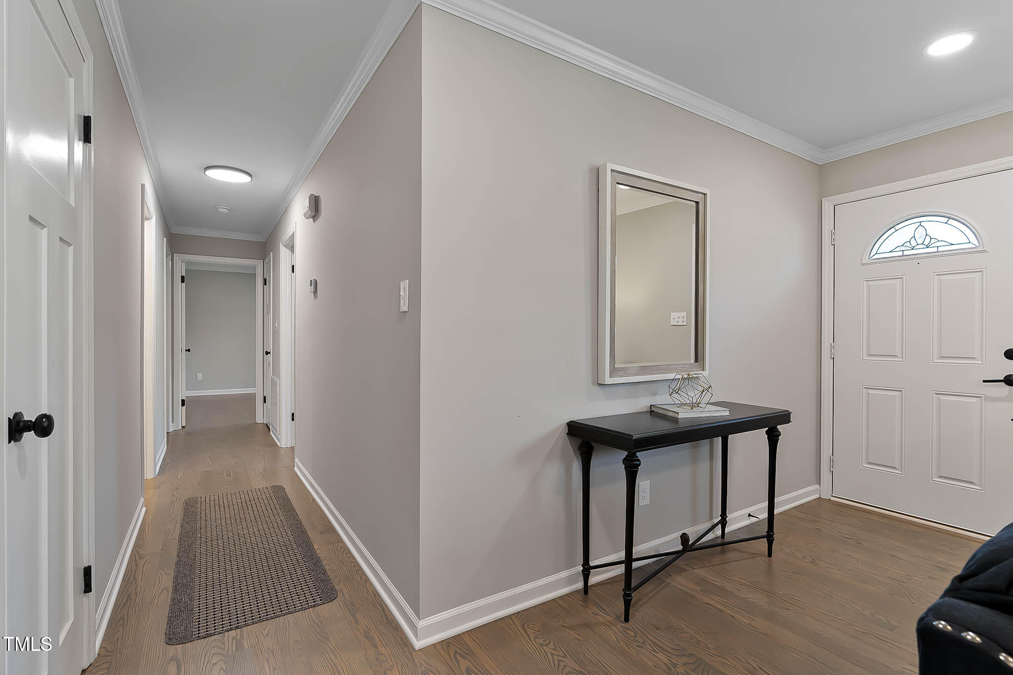 2704 Ross Road Durham, NC 27703 - Photo 5 of 28 a view of a livingroom from a hallway