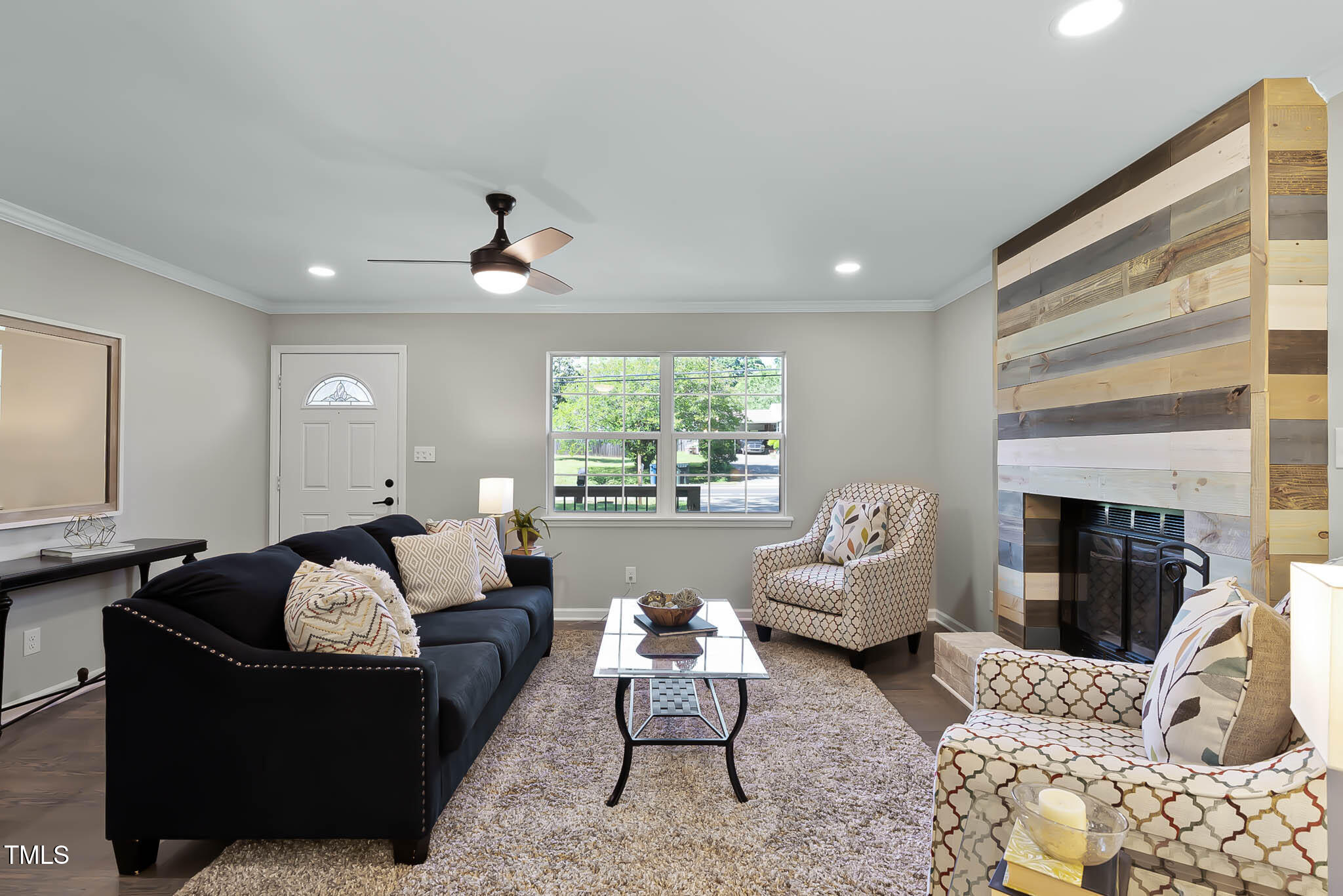 2704 Ross Road Durham, NC 27703 - Photo 6 of 28 a living room with furniture fireplace and window