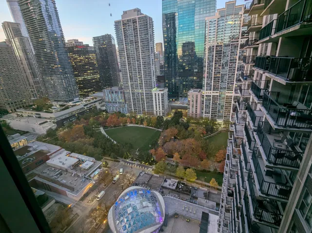 a view of a city with tall buildings