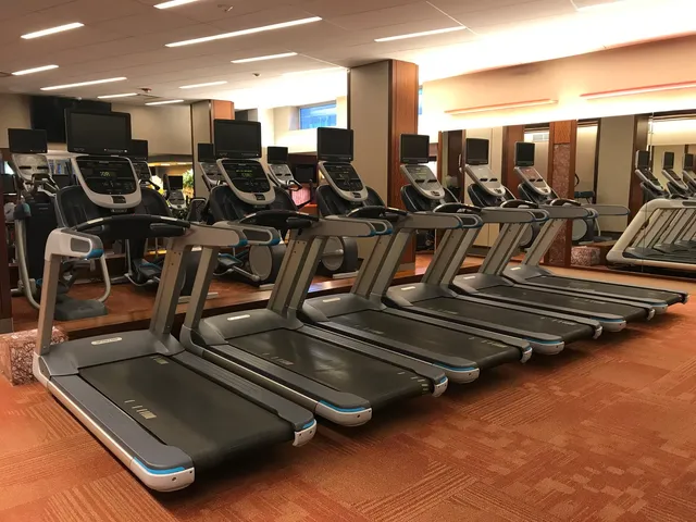 a view of a chairs and tables in the balcony