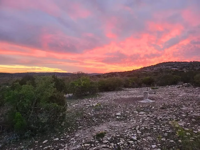 a view of mountain view with lots of trees