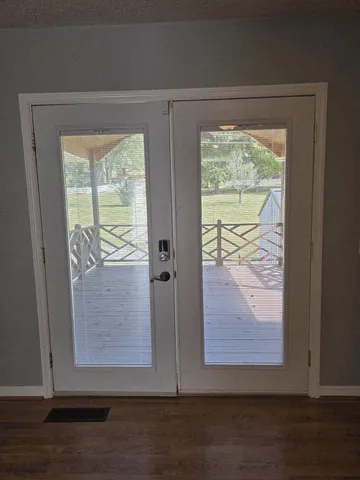 a kitchen with stainless steel appliances granite countertop a stove refrigerator and cabinets