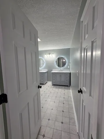 a view of a bathroom with shower