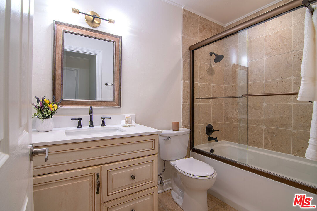 4925 Indian Wood Road, Unit 474 Culver City, CA 90230 - Photo 20 of 36 a bathroom with a sink a toilet and shower