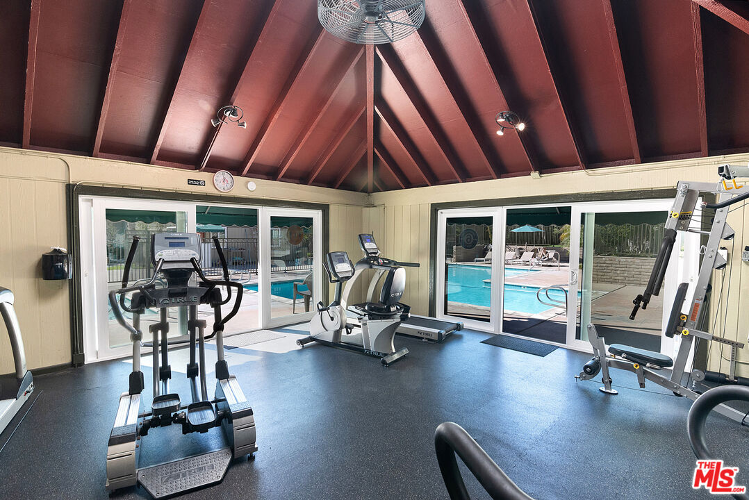 4925 Indian Wood Road, Unit 474 Culver City, CA 90230 - Photo 33 of 36 a room with gym equipment and wooden floor