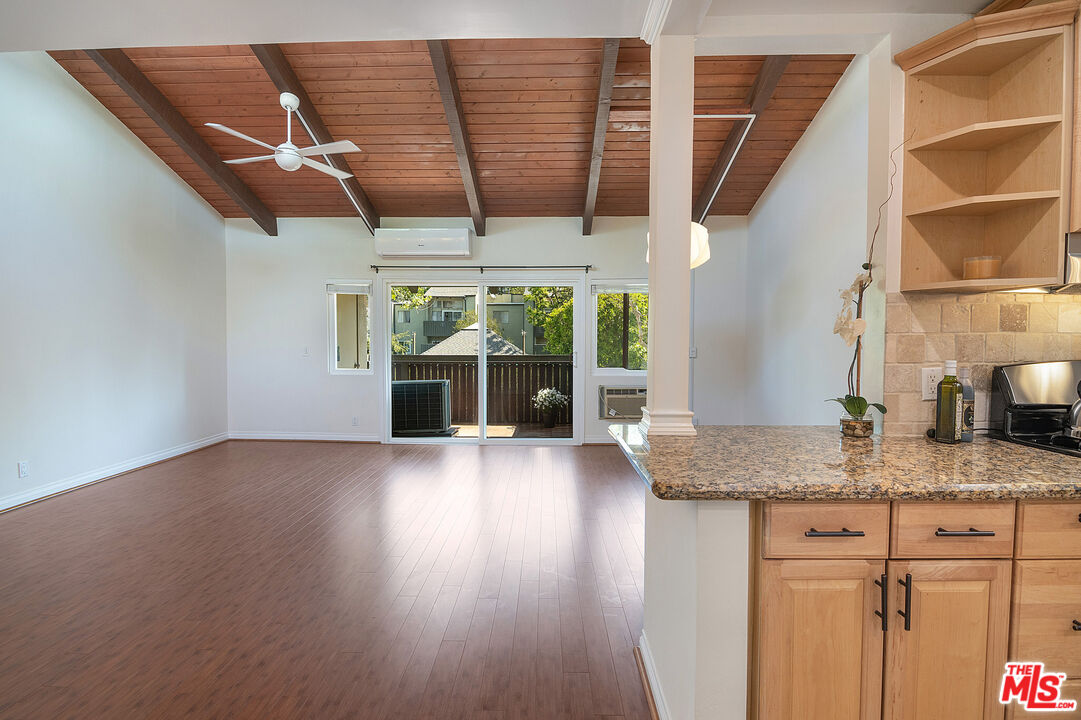 4925 Indian Wood Road, Unit 474 Culver City, CA 90230 - Photo 9 of 36 a view of room with a window and wooden floor
