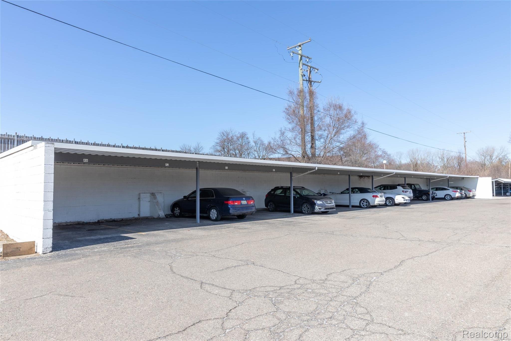 1095 Tienken Court, Unit 101 Rochester, MI 48306 - Photo 19 of 19 Convenient Carport