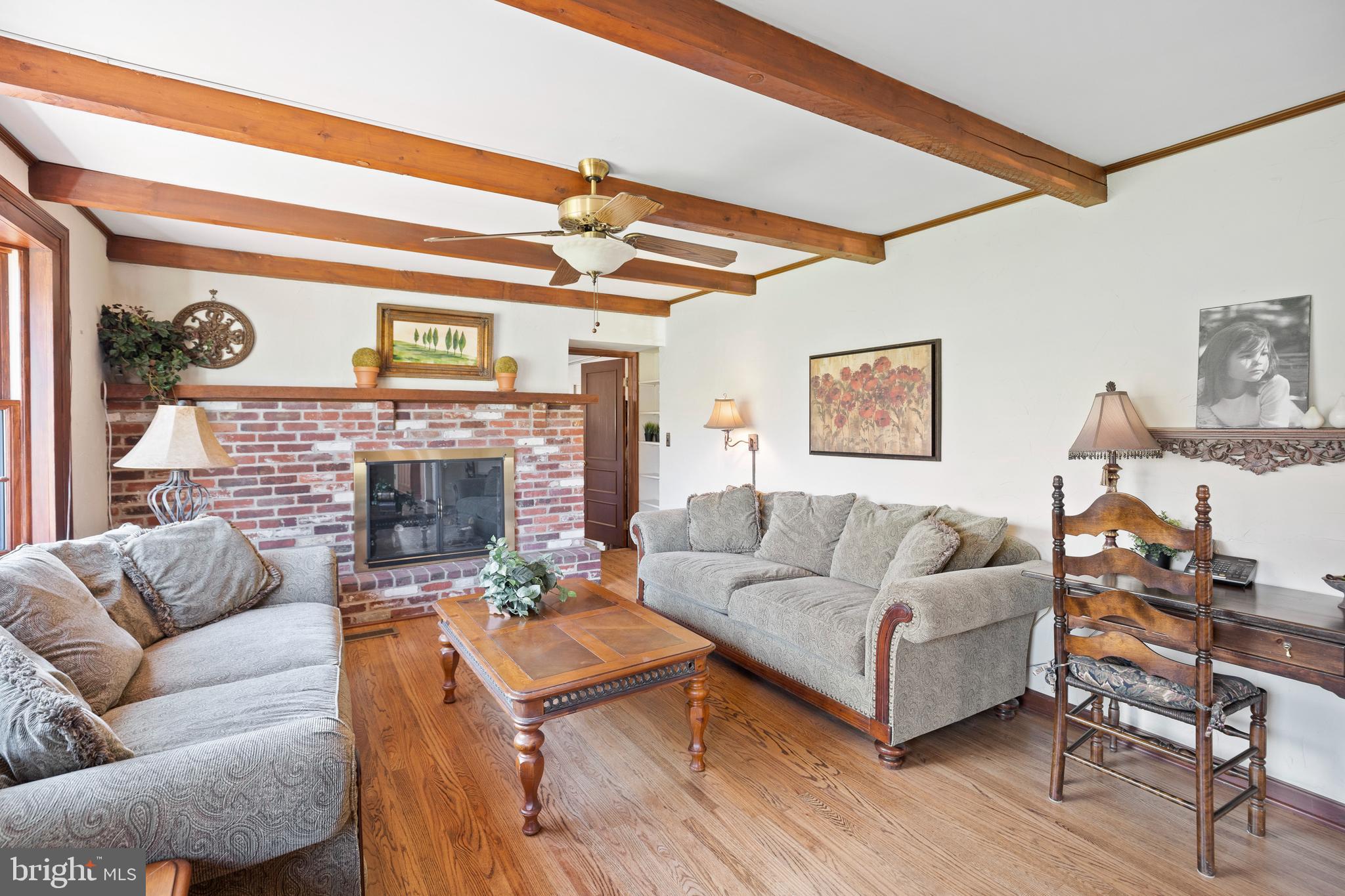 262 Coldstream Drive Berwyn, PA 19312 - Photo 11 of 45 a living room with furniture and a fireplace