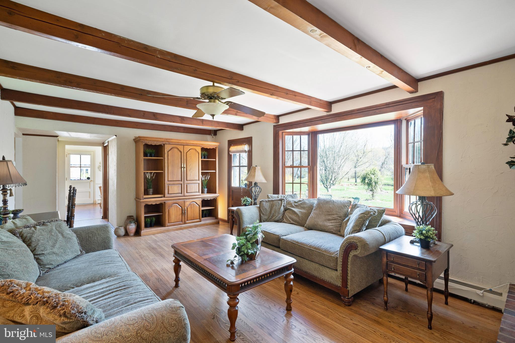 262 Coldstream Drive Berwyn, PA 19312 - Photo 12 of 45 a living room with furniture and a large window