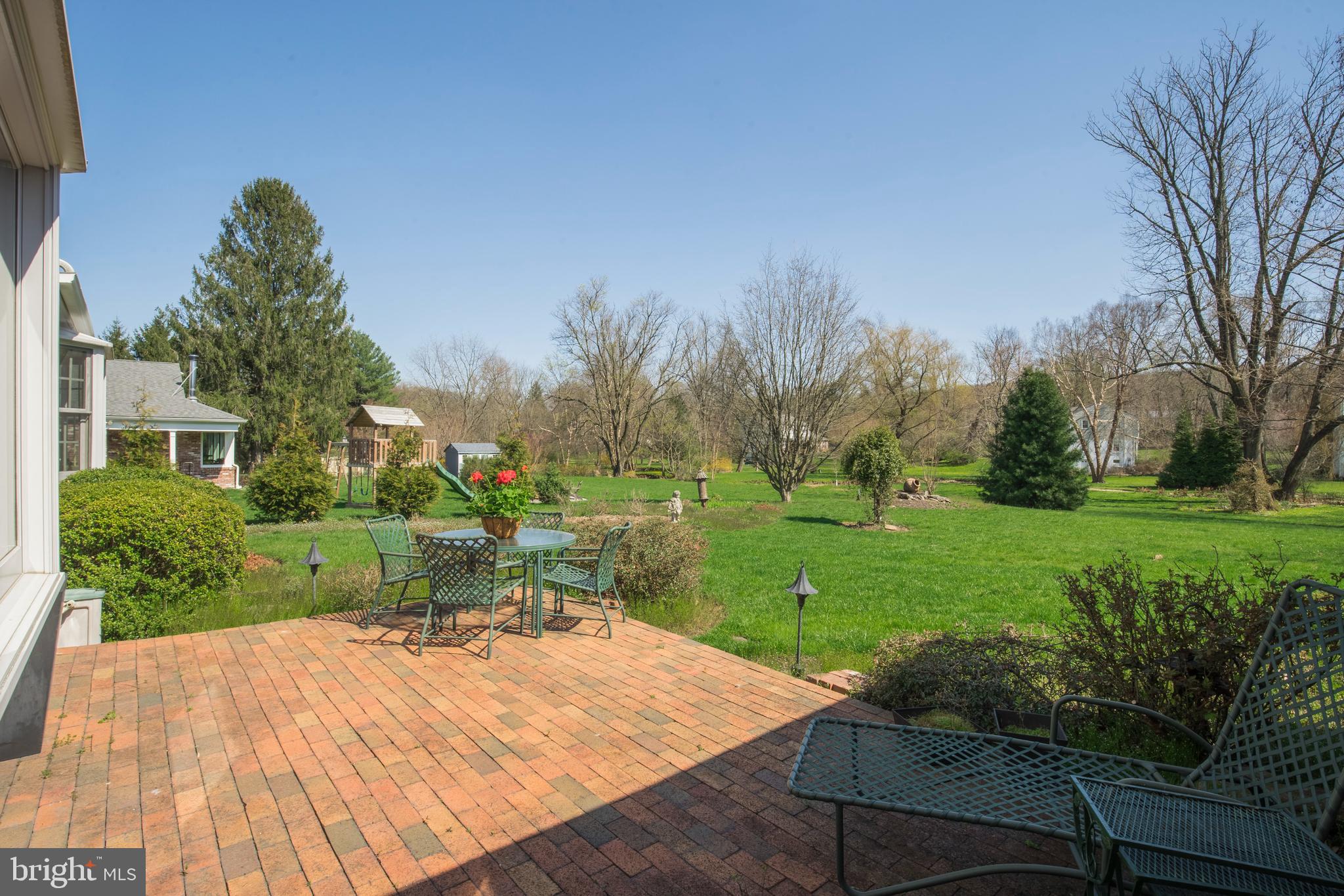 262 Coldstream Drive Berwyn, PA 19312 - Photo 26 of 45 a view of a backyard with sitting area