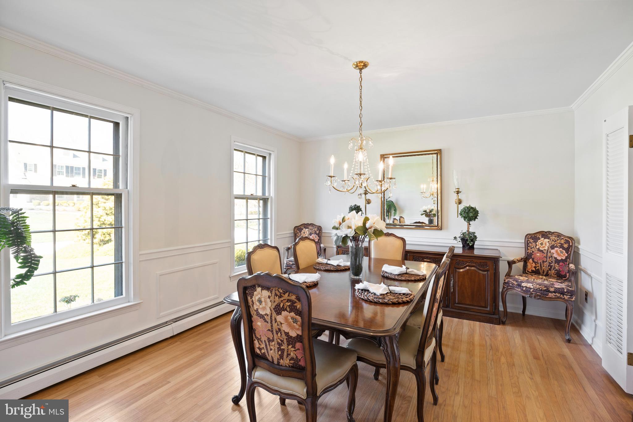262 Coldstream Drive Berwyn, PA 19312 - Photo 3 of 45 a view of a dining room with furniture window and wooden floor