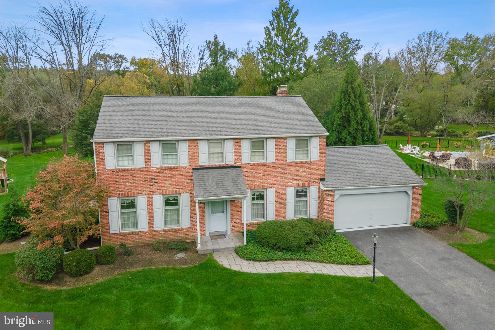 262 Coldstream Drive Berwyn, PA 19312 - Photo 45 of 45 a aerial view of a brick house next to a yard