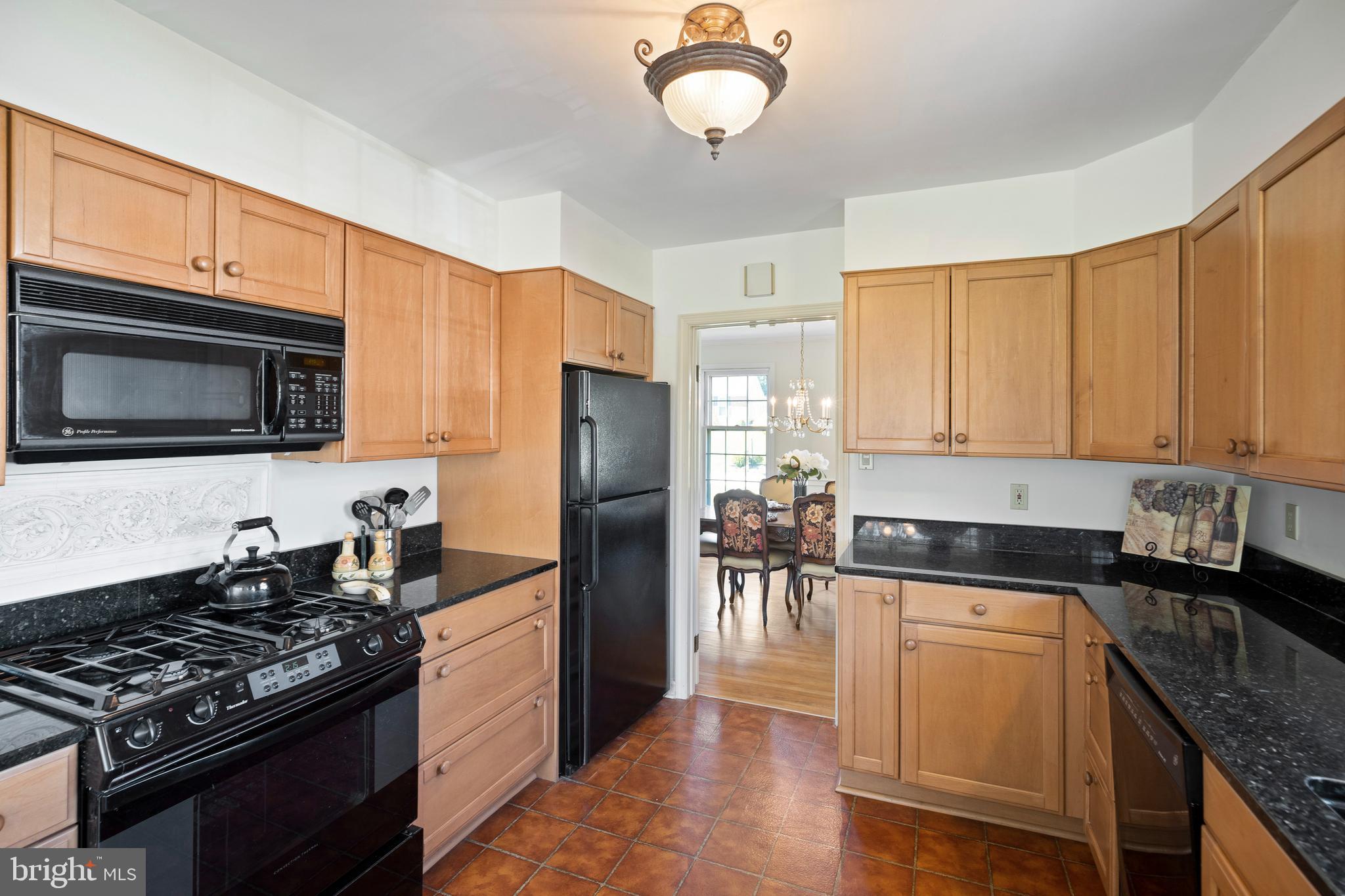 262 Coldstream Drive Berwyn, PA 19312 - Photo 7 of 45 a kitchen with stainless steel appliances granite countertop a stove a sink dishwasher a refrigerator microwave and cabinets