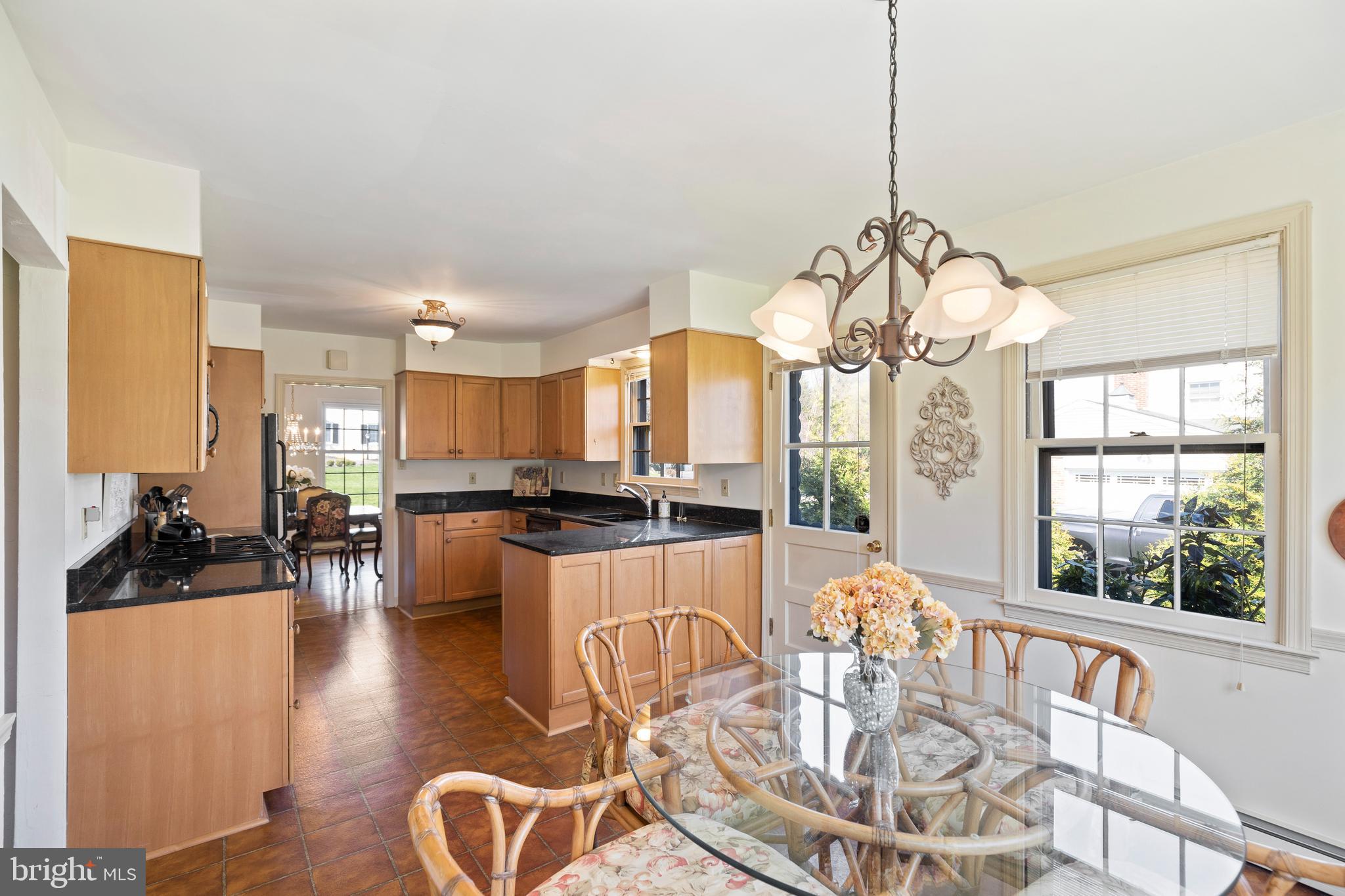 262 Coldstream Drive Berwyn, PA 19312 - Photo 9 of 45 a view of a dining room with furniture a chandelier and wooden floor
