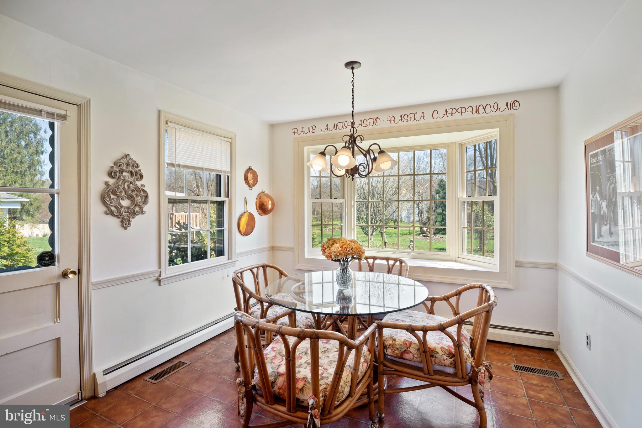 262 Coldstream Drive Berwyn, PA 19312 - Photo 10 of 45 a dining room with furniture a chandelier and wooden floor