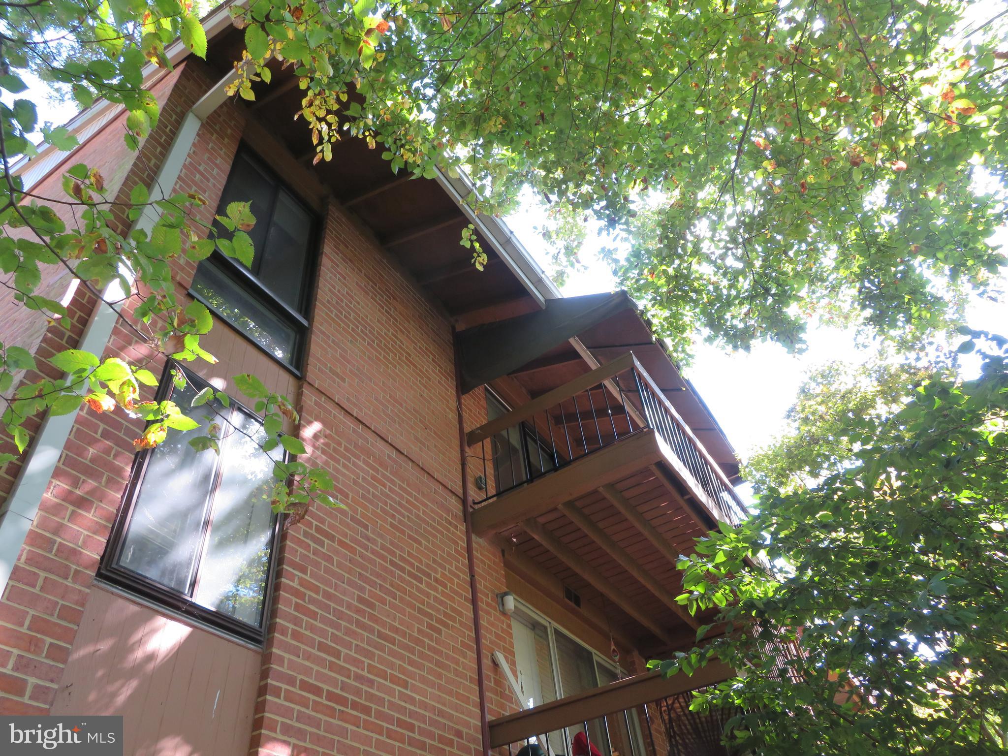 12 Cross Keys Road, Unit 12F Baltimore, MD 21210 - Photo 36 of 42 Balcony is up in the treetops