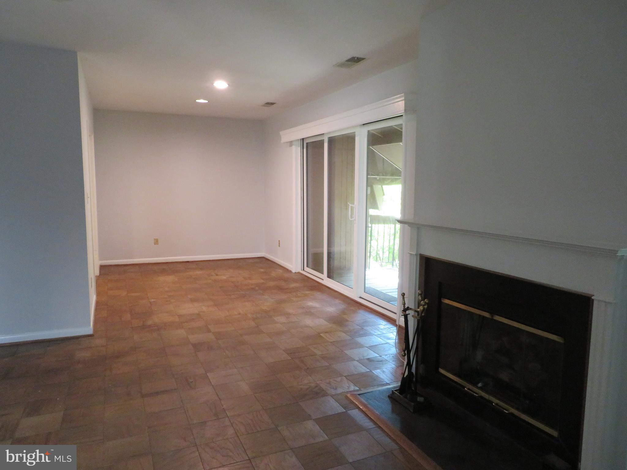 12 Cross Keys Road, Unit 12F Baltimore, MD 21210 - Photo 9 of 42 Dining Area with triple slider to balcony