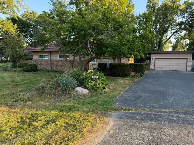 a view of a couches in backyard of house