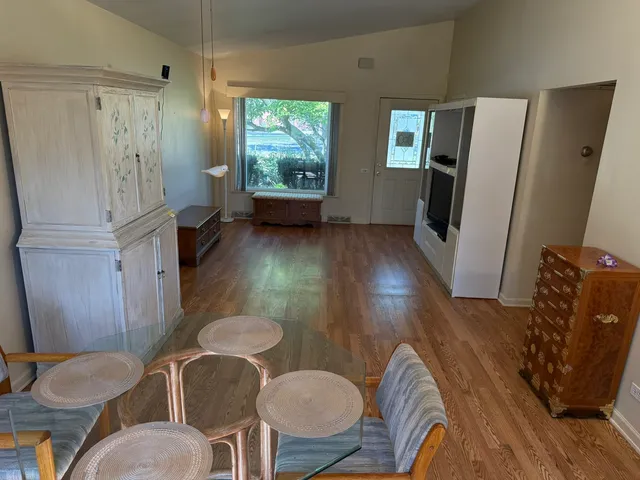 a kitchen with furniture and a fireplace