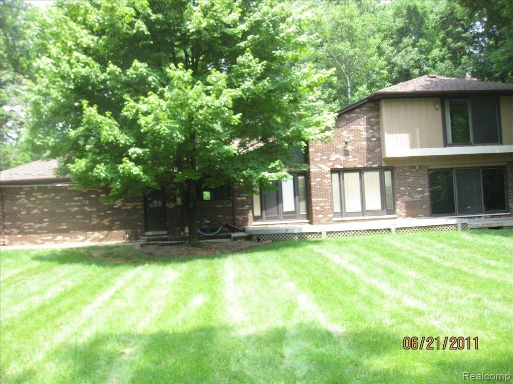 8849 Bridge Road Grosse Ile, MI 48138 - Photo 4 of 25 Rear view