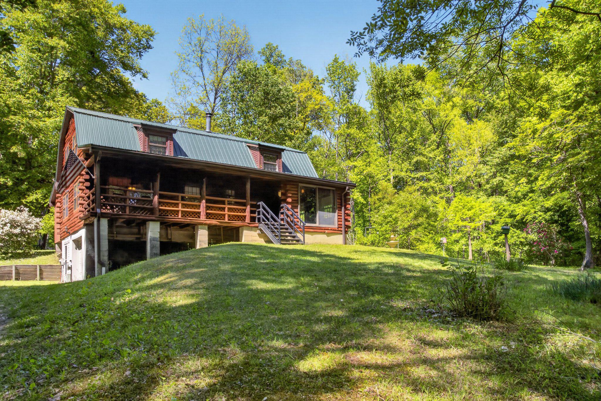 403 Union Church Road Townsend, DE 19734 - Photo 14 of 73 Charming log cabin nestled in nature.