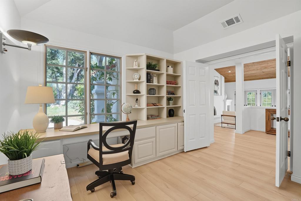 2206 Running Spring Place Encinitas, CA 92024 - Photo 29 of 44 a view of a livingroom with furniture and a window