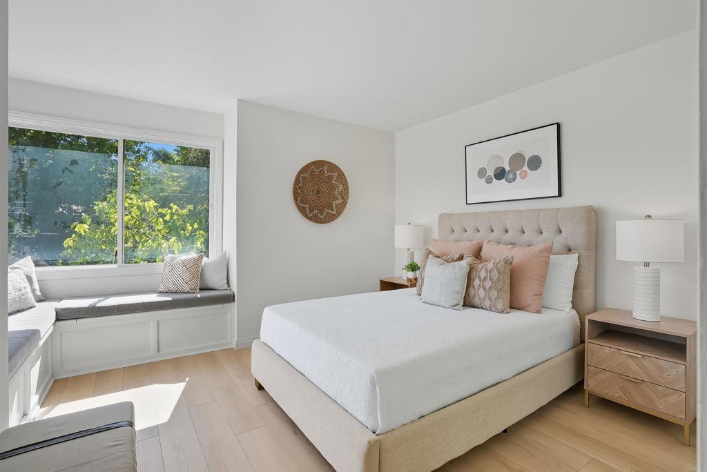2206 Running Spring Place Encinitas, CA 92024 - Photo 34 of 44 a bedroom with a large bed and a window