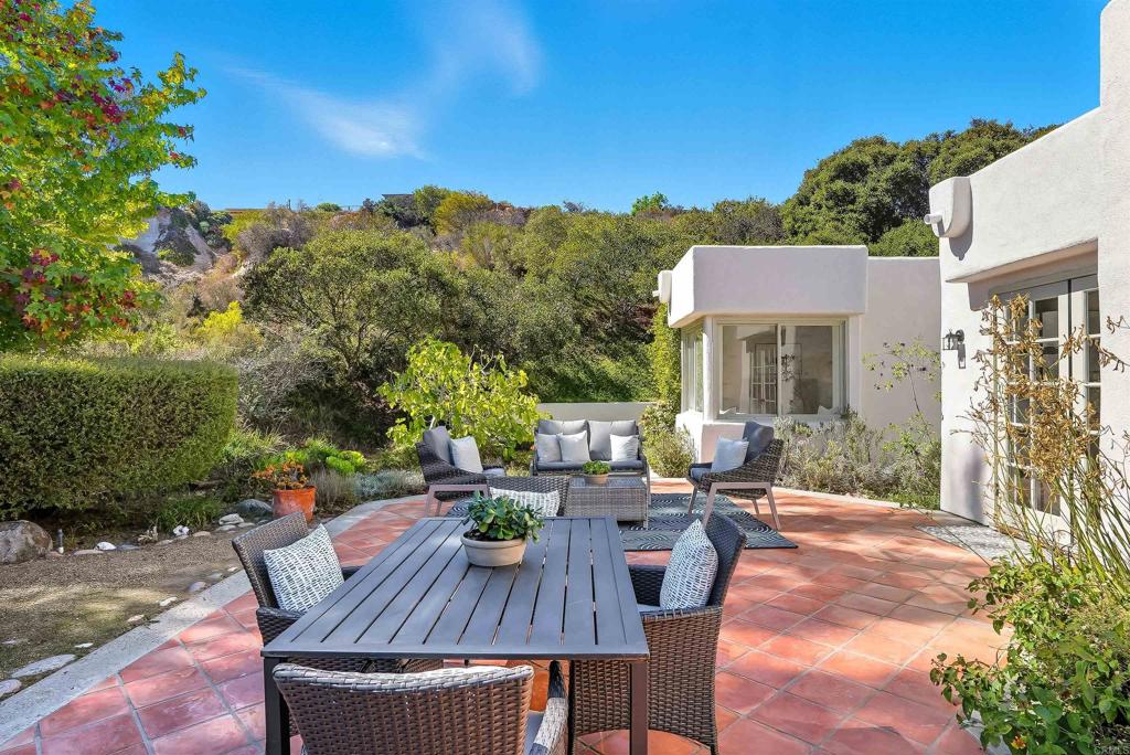 2206 Running Spring Place Encinitas, CA 92024 - Photo 42 of 44 a view of a house with backyard and sitting area