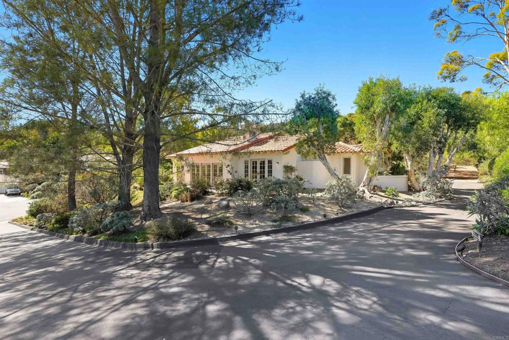 2206 Running Spring Place Encinitas, CA 92024 - Photo 6 of 44 a view of a house with a yard