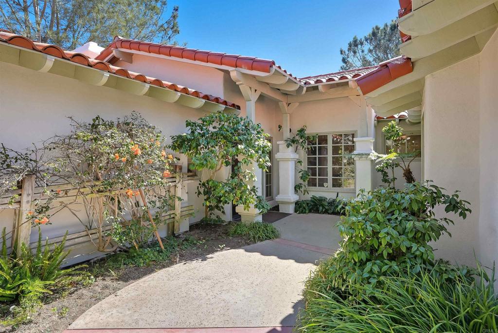 2206 Running Spring Place Encinitas, CA 92024 - Photo 9 of 44 a view of a house with a garden