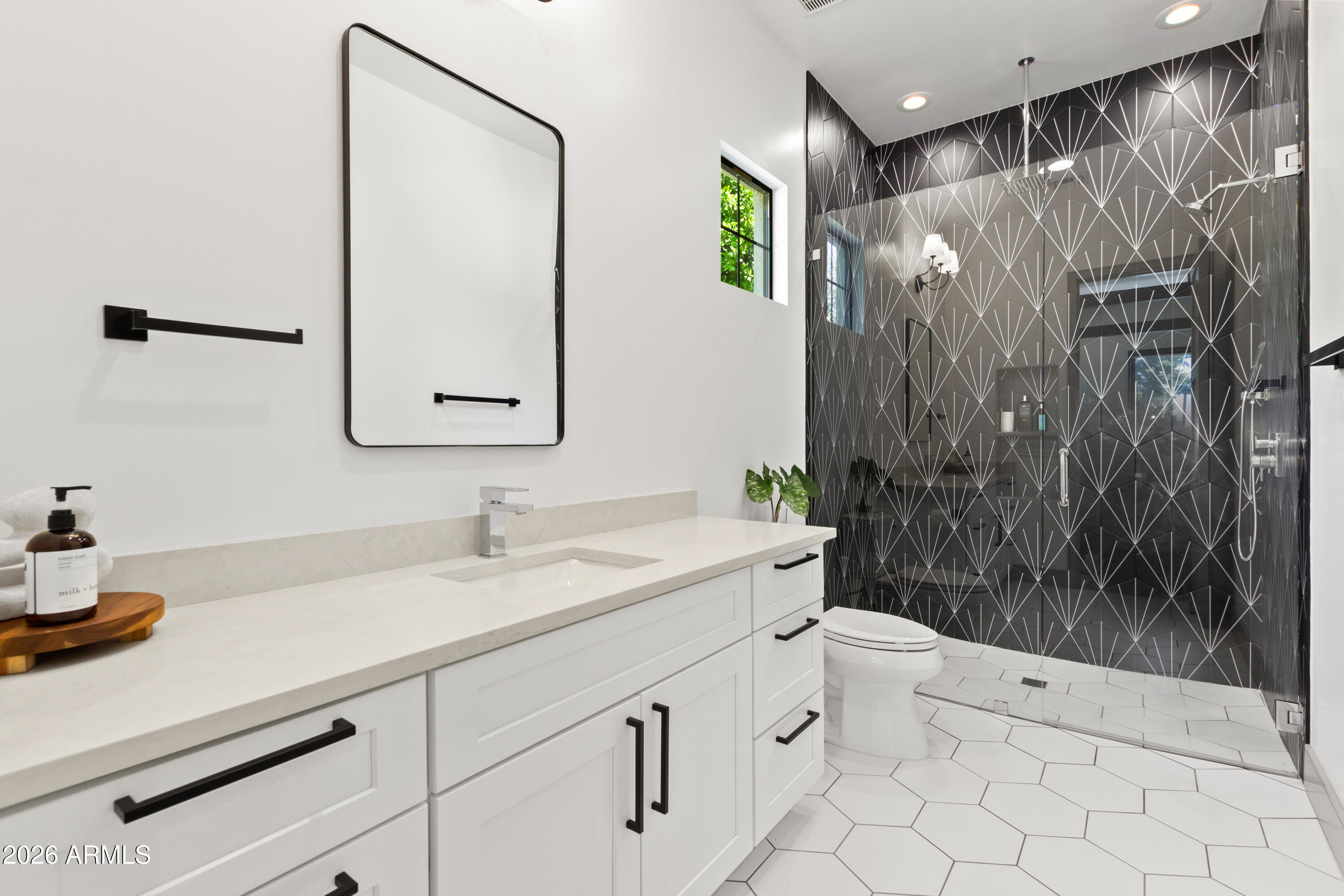 2912 East Pierson Street Phoenix, AZ 85016 - Photo 48 of 86 a bathroom with a sink a toilet and shower