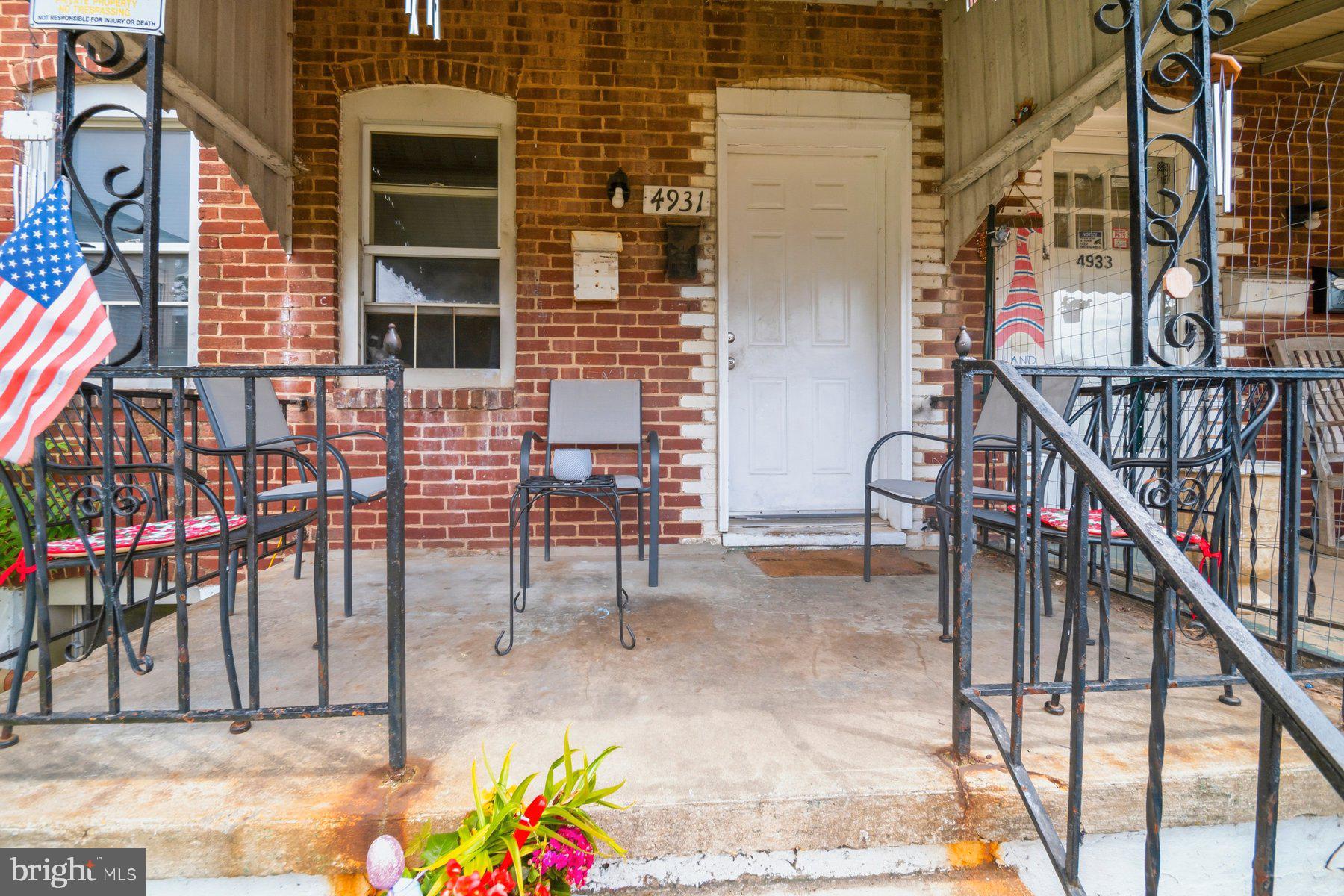 4931 Brookwood Road Baltimore, MD 21225 - Photo 2 of 25 a view of front door and porch