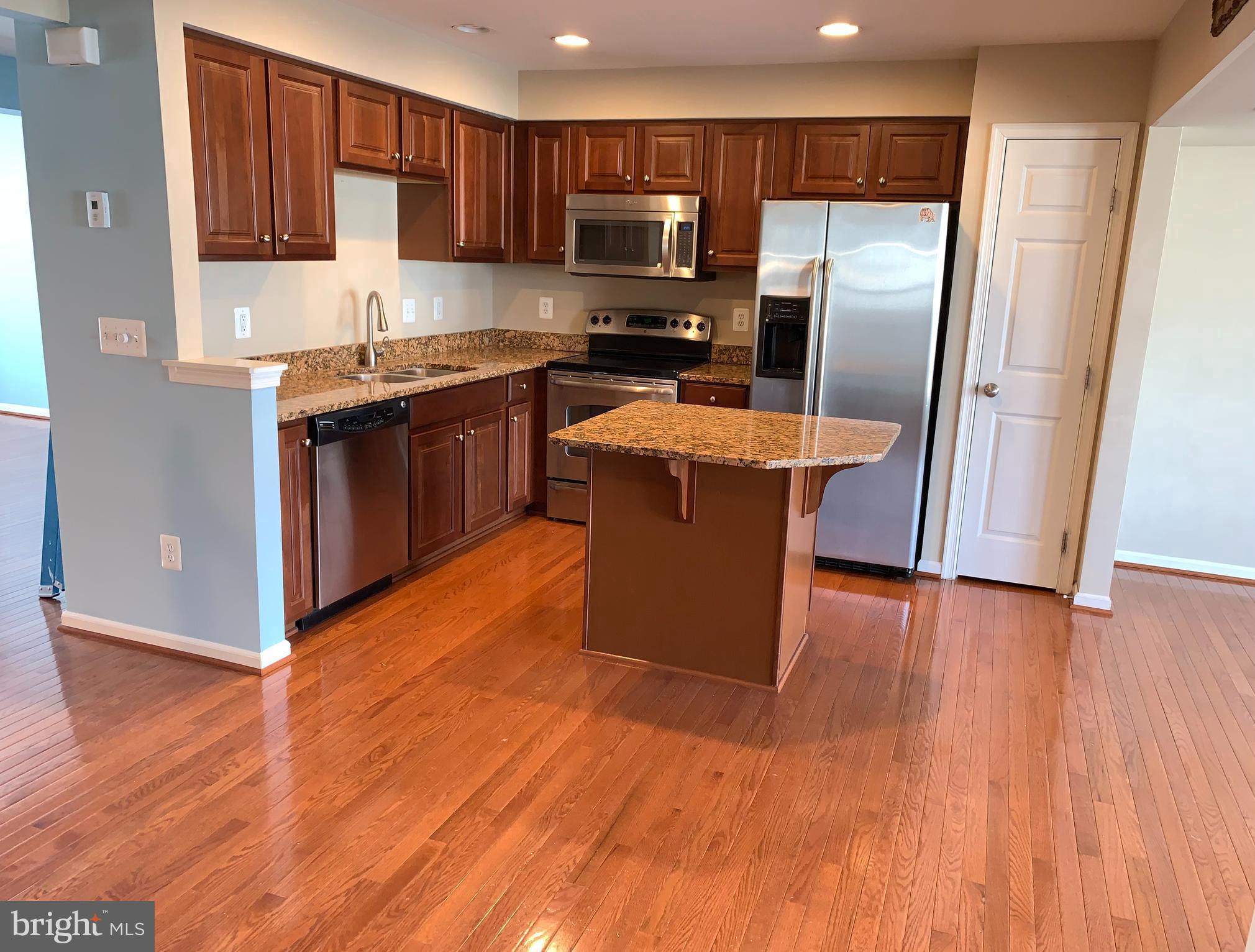 1229 Steed Street Ranson, WV 25438 - Photo 10 of 21 KITCHEN WITH GRANITE AND SS APPLIANCES